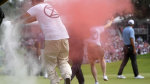 Six climate protesters run onto 18th green and spray powder delaying finish of PGA Tour event The Associated Press Six climate protesters run onto 18th green and spray powder delaying finish of PGA Tour event The Associated Press