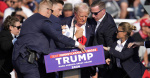 Trump safe after rally shooting says bullet struck his ear gunman and audience member dead  CBS News Trump safe after rally shooting says bullet struck his ear gunman and audience member dead  CBS News