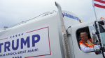 Donald Trump boards a garbage truck to draw attention to Biden remark The Associated Press Donald Trump boards a garbage truck to draw attention to Biden remark The Associated Press