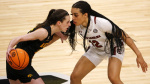 March Madness will pay womens teams under a new structure approved by the NCAA  CNN