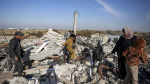 Palestinians confront a landscape of destruction in Gazas ghost towns The Associated Press Palestinians confront a landscape of destruction in Gazas ghost towns The Associated Press