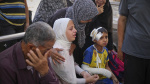 Israeli forces fire on people waiting for aid in Gaza killing 25 witnesses and hospitals say AP News Israeli forces fire on people waiting for aid in Gaza killing 25 witnesses and hospitals say AP News