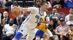 Mavericks rookie Cooper Flagg all business as he makes his professional debut at NBA Summer League  AP News