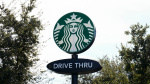 Starbucks workers kick off 65store US strike on companys busy Red Cup Day  AP News