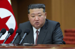 Kim vows to irreversibly cement North Koreas nuclear status calls South most hostile  AP News