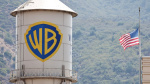 Warner Bros Discovery books 29 billion net loss tied to Paramount deal restructuring costs  CNBC