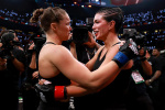 Ronda Rousey tears through Gina Carano with 17second armbar to win historic Netflix comeback  Yahoo Sports