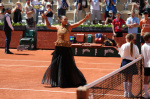 Naomi Osakas sequined gold dress at the French Open reminds her of the Eiffel Tower at night  AP News