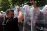 Albanian police use tear gas and pepper spray as Tirana protest turns violent  AP News