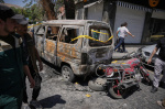 Explosions rock Syrias capital as French President Macron visits  AP News