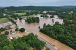 Missouri flooding leaves one dead while rescuers helicopter more than 200 to safety at summer camp  AP News
