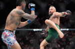 Conor McGregor suffers early knee injury in return loses to Max Holloway at UFC 329  AP News