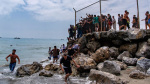 Spain Morocco try to halt deadly rush on Spanish enclave after tens of thousands cross in a day  CNN