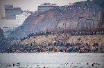 Spains PM blames trafficking gangs as 60000 cross into Ceuta from Morocco with 41 deaths  AP News