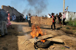 WHO chief visits Congo to support Ebola efforts as some workers strike over pay  AP News