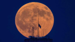 PHOTOS Moon appears orange due to partial lunar eclipse  WLWT