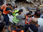 Gaza building collapse kills 12 traps dozens under rubble  Al Jazeera