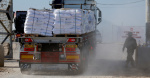 Nearly 100 food aid trucks violently looted in Gaza UN agencies say  Reuters
