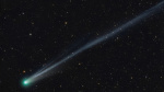 2 green comets shine bright How to spot them in the night sky  AP News