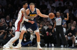 Nuggets Nikola Jokic suffers knee injury leaves game in Miami  The Denver Post