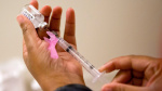 Flu season surged in the US over the holiday and already rivals last winters harsh epidemic  AP News
