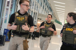 Photos show ICE agents at US airports where the partial government shutdown triggered delays  AP News