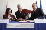 UK and French governments sign a 3year deal to curb migrant crossings in English Channel  AP News
