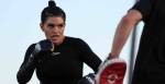 She hits like a grown fcking man Gina Caranos head coach teammates praise her preparation for Ronda Rousey  MMA Fighting