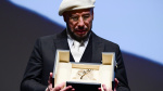 John Travolta cries after surprise award at Cannes Film Festival  USA Today