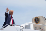 Trump says he wants his new acting director of national intelligence to cut the office  AP News