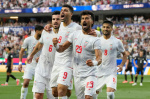 Iran opens a politically charged World Cup by playing to a 22 draw with New Zealand  AP News