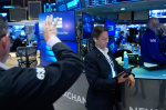 US stocks hold steadier after inflation data even as IBM plunges  AP News