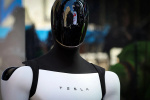 Tesla reports Q2 earnings miss but beats on revenue cash burn rate less than expected  Yahoo Finance