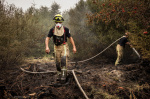 Firefighters battle massive wildfires in Belgium and Greece as 2 die on an island near Athens  AP News