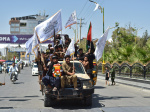 Photos Patriotic music and flags mark Taliban rule anniversary in Kabul  Al Jazeera
