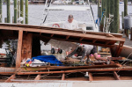 Isaias weakens but flooding threat persists as hundreds of thousands grapple with power outages  AP News